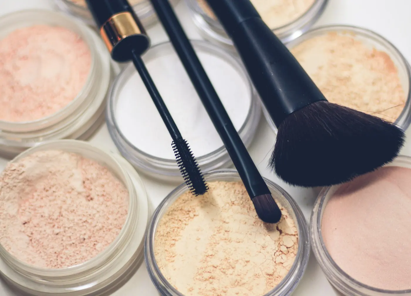 Makeup artist finishing a client look